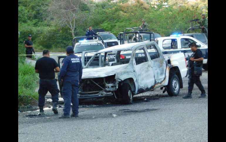 Diversas corporaciones de seguridad realizaron un operativo especial mientras se daba el levantamiento de cuerpos. EFE / ARCHIVO