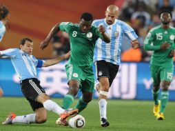 Molestia en los aficionados por no poder ver el partido completo de Nigeria contra Argentina. AP  /