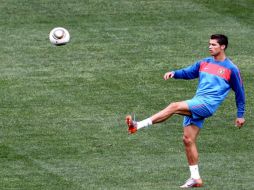 Cristiano Rolando se prepara en los entrenamientos con la Selección de Portugal y terminar con su sequía de goles. EFE  /