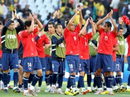 Los jugadores de Chile tuvieron su primer triunfo en un Mundial. EFE  /