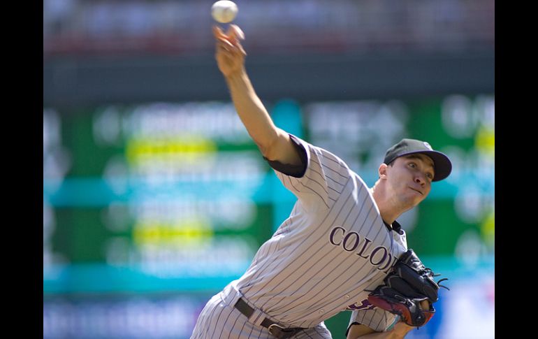 El serpentinero dominicano de los Rockies de Colorado tiene un promedio de carreras limpias admitidas de 1.15. AP  /