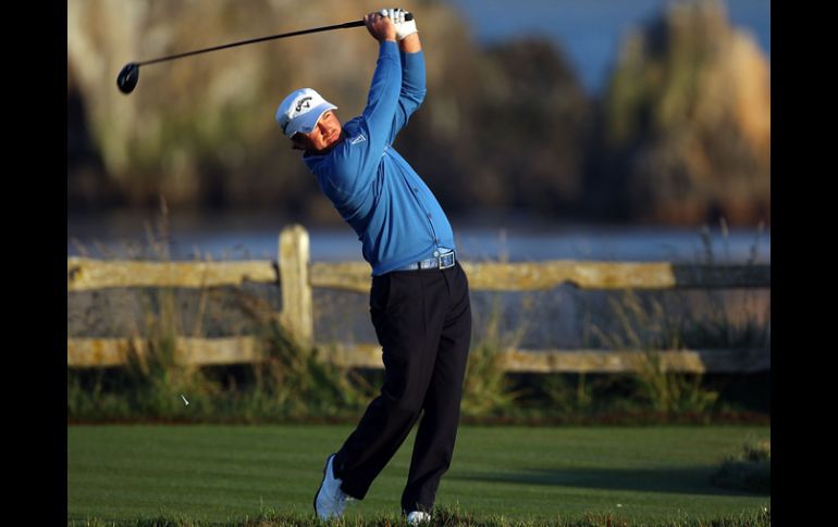 Graeme McDowell efectúa un tiro en la jornada de hoy. AFP  /