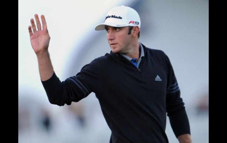 Dustin Johnson toma el liderato en el US Open. AFP  /