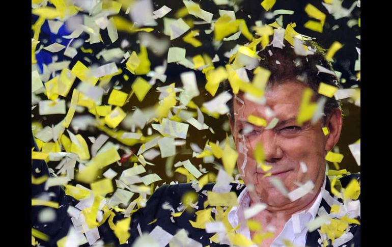 El presidente electo de Colombia, Juan Manuel Santos, celebra su triunfo. AFP  /