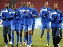 Los seleccionados de Honduras entrenan para no ser eliminados en su encuentro ante Suiza. EFE  /