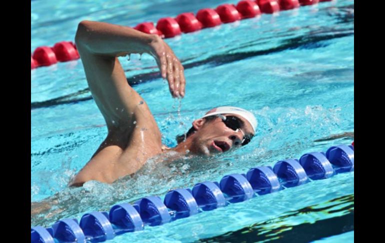 Michael Phelps se prepara para disputar cuatro pruebas en el certamen. AP  /