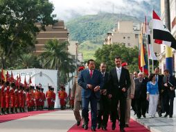 El presidente de Venezuela, Hugo Chávez, y su homólogo sirio Bashar Assad, en Caracas. AFP  /