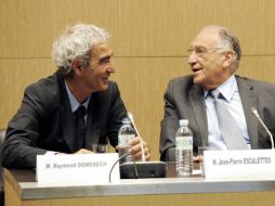 Raymond Domenech (izq.) se reunió con el presidente de la Federación Francesa de Futbol Jean-Pierre Escalettes. AFP  /