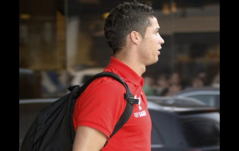 El portugués Cristiano Ronaldo en su llegada a Lisboa. AP  /