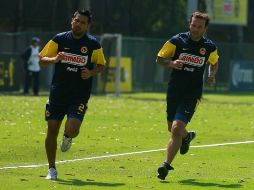 Matias Vuoso (der.) y de Ismael Rodríguez de América, durante una sesión de entrenamiento. MEXSPORT  /