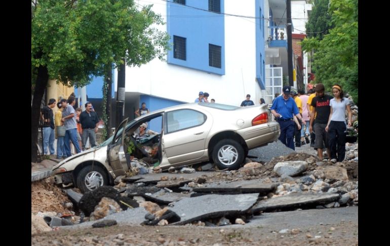 El huracan Alex a su pasó por Nuevo León dejó tanto pérdidas humanas como materiales. AFP  /