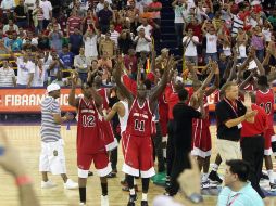 Jugadores de Trinidad y Tobago celebran el triunfo ante la Selección de Puerto Rico, en el Campeonato Centrobasket. EFE  /