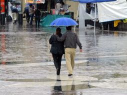 La lluvia que inició la noche del miércoles causó los principales daños en los municipios de Zapopan. E. BARRERA  /