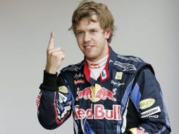 Sebastian Vettel celebrando su primer lugar de la partida. AFP  /