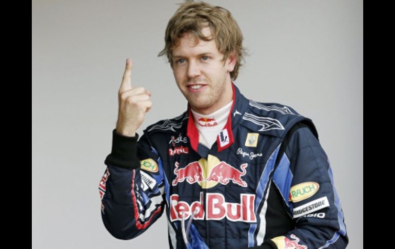 Sebastian Vettel celebrando su primer lugar de la partida. AFP  /