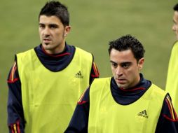 David Villa (izq.) y Xavi Hernández en el último entrenamiento en Sudáfrica. EFE  /