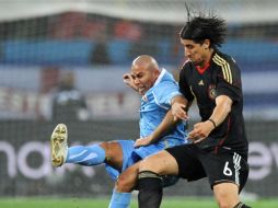 Sami Khedira (der.) durante el juego ante Uruguay. AFP  /