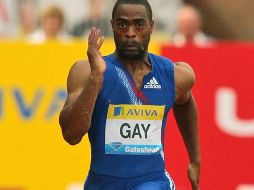 Tyson Gay superó a Asafa Powell por dos centésimas de segundo. AP  /