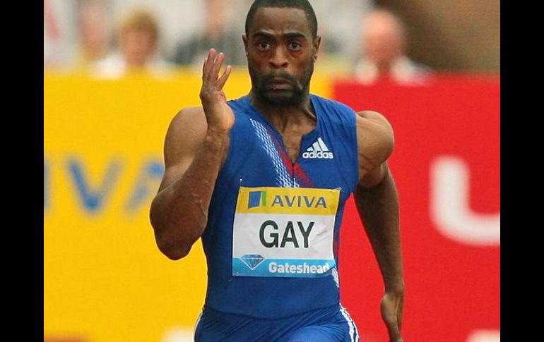 Tyson Gay superó a Asafa Powell por dos centésimas de segundo. AP  /