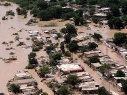 En Nueva Rosita, Coahuila, se desbordaron el Río Sabinas y los arroyos Aguililla y Blanco. EFE  /