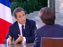 El presidente francés Nicolas Sarkozy, durante su entrevista con David Pujadas, de France 2. AFP  /