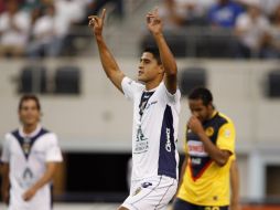 Fausto Ruiz, celebra tras anotar el tercer gol ante América. REUTERS  /