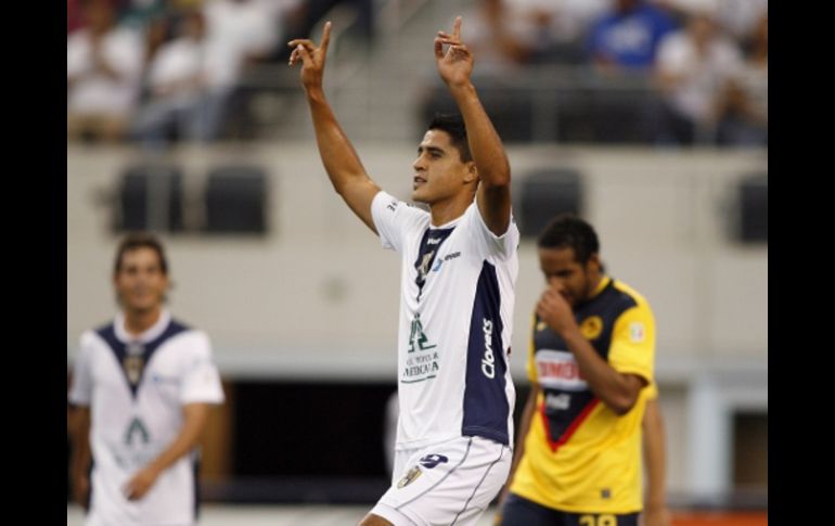 Fausto Ruiz, celebra tras anotar el tercer gol ante América. REUTERS  /