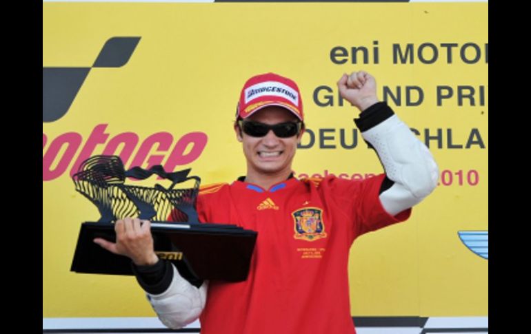 Dani Pedrosa celebra su triunfo en el Gran Premio de Alemania de Moto GP. AFP  /