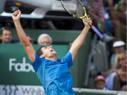 Nicolás Almagro festejando su victoria en el torneo. AP  /