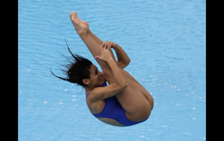 La sudcaliforniana Paola Espinosa ganó su primera presea de oro en esta justa. AP  /