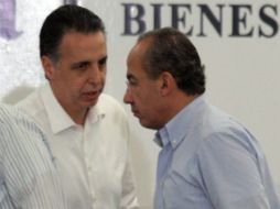 El Secretario de Economía, Bruno Ferrari (izq.), y el Presidente Calderón durante la gira de trabajo por Sonora. NTX  /