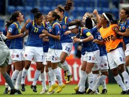 Las jugadores colombianas festejan la clasificación. FIFA.COM  /