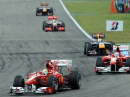 Fernando Alonso se impone por delante de la competencia en el Gran Premio de Alemania. AFP  /