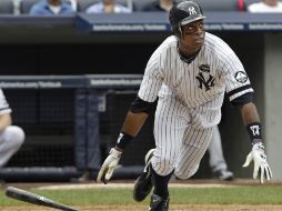 Curtis Granderson (foto) mandó la bola para el otro lado en dos ocasiones, y no quien la afición esperaba, A-Rod. AP  /