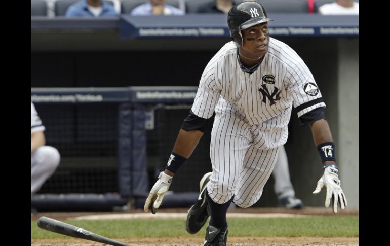 Curtis Granderson (foto) mandó la bola para el otro lado en dos ocasiones, y no quien la afición esperaba, A-Rod. AP  /