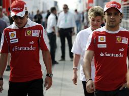 Fernando Alonso y Felipe Massa al momento de llegar al Hungaroring. AFP  /