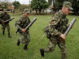 Se conocen a los 'falsos positivos' a los asesinatos presentados a la opinión pública como guerrilleros por el Ejército. AP  /