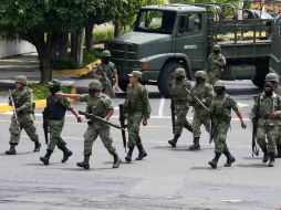 Elementos del Ejército Mexicano aseguraron dos casas de seguridad y casi siete millones de dólares. O. RUVALCABA  /