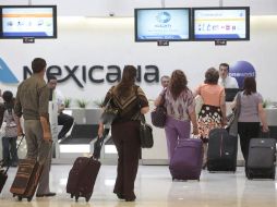 Taquillas de Mexicana de Aviación en el aeropuerto de la Ciudad de México, donde hoy operan con normalidad. EL UNIVERSAL  /