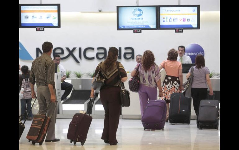 Taquillas de Mexicana de Aviación en el aeropuerto de la Ciudad de México, donde hoy operan con normalidad. EL UNIVERSAL  /