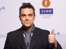 El cantante Robbie Williams se casará mañana con la actriz Ayda Field. EFE  /