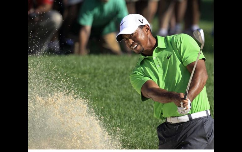 Tiger Woods durante la tercera rueda del torneo de golf de Bridgestone. AP  /