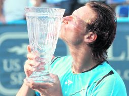 Nalbandian no jugaba un torneo desde abril por lesión, y ayer conquistó el undécimo título de su carrera. AFP  /