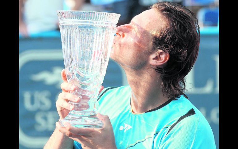 Nalbandian no jugaba un torneo desde abril por lesión, y ayer conquistó el undécimo título de su carrera. AFP  /