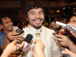 El campeón Manny Pacquiao seguirá preparándose para su siguiente combate. AFP  /