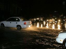 En algunas zonas, la lluvia provocó encharcamientos. ARCHIVO  /