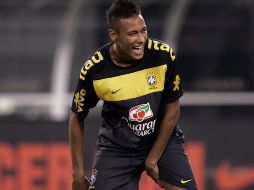 Neymar ríe durante una sesión de entrenamiento previa al juego contra Estados Unidos en la fecha FIFA pasada. EFE  /