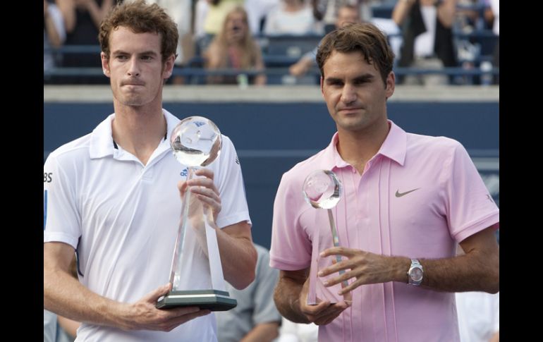 Murray y Federer posan para los reporteros gráficos. AP  /