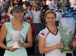 Kim Clijsters (der) ha regresado al lugar victorioso que le correspondía. AFP  /