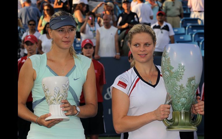 Kim Clijsters (der) ha regresado al lugar victorioso que le correspondía. AFP  /